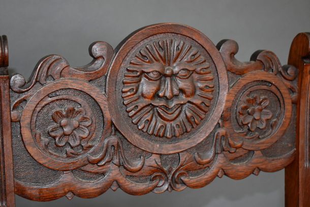 Detail of Barber’s classic “sun” motif carving